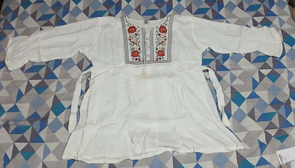Women Embroidered Viscose Rayon Straight Kurta  (White) blue flowers with green stems