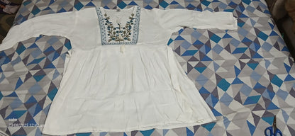 Women Embroidered Viscose Rayon Straight Kurta  (White) blue flowers with green stems